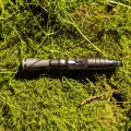 DynaVap HyperDyn – Gerät im Freien auf Moos